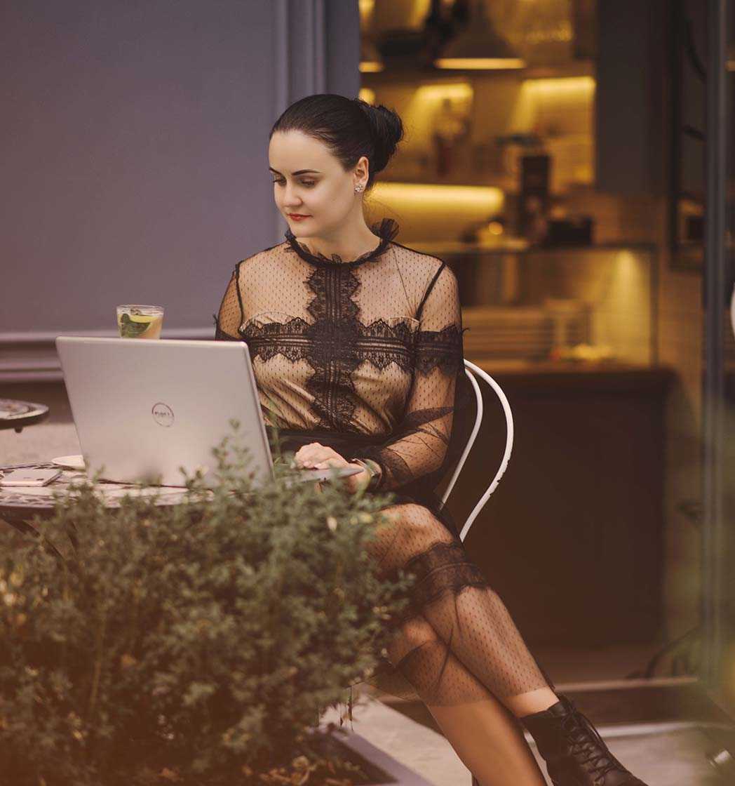 Julia in the office with a laptop